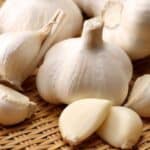 From planting cloves in fall to harvesting in summer, this step-by-step garlic growing guide will help you enjoy a bountiful harvest of flavorful, homegrown garlic.