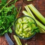 How to regrow celery! Tips for growing celery indoors in water from celery scraps. One of my favorite vegetables to regrow.