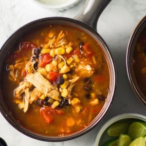 Warm up with our flavorful chicken taco soup, a perfect blend of tender chicken, vibrant vegetables, and zesty taco spices. This easy one-pot recipe is ideal for cozy nights or busy weeknights, offering a nutritious and satisfying meal that the whole family will love. Top with avocado, cilantro, and lime for a delicious twist!
