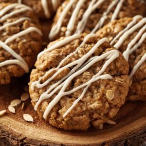 These festive iced oatmeal cookies are perfect for Christmas! Soft, chewy, and beautifully decorated with holiday-colored icing and sprinkles.