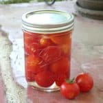 Recipe for making and canning pickled cherry tomatoes. Add pickled tomatoes to pasta salads or eat right out of the jar! Easy recipe for beginning canners.