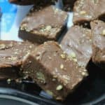 Easy three ingredient fudge recipe made with condensed milk, chocolate chips, and nuts. One of my favorite quick easy holiday desserts.