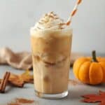 Iced pumpkin latte with a sprinkle of nutmeg and cinnamon