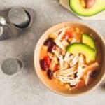 Craving something hearty and delicious? Try this Chicken Enchilada Soup! Packed with bold flavors and nutritious ingredients, it's the ultimate comfort food. Easy to make and customizable with your favorite toppings—it's a family favorite you'll want to make again and again!